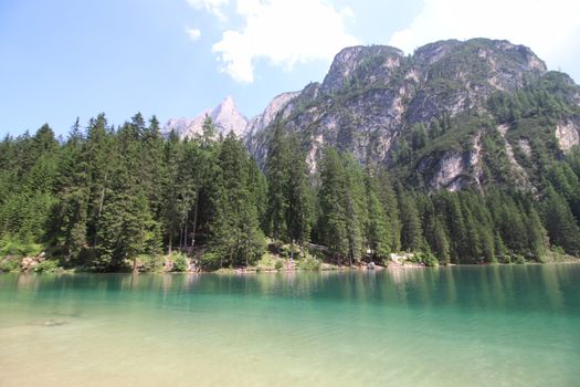 Braies lake turquoise water and Dolomites Alps view, South Tyrol region of Italy