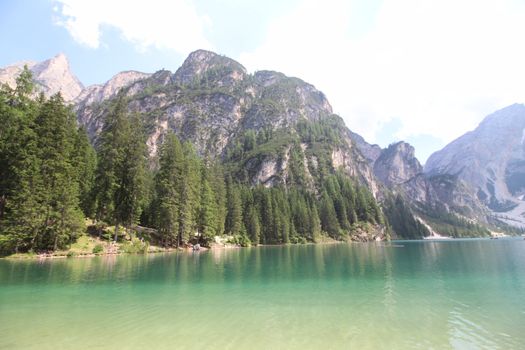 Braies lake turquoise water and Dolomites Alps view, South Tyrol region of Italy