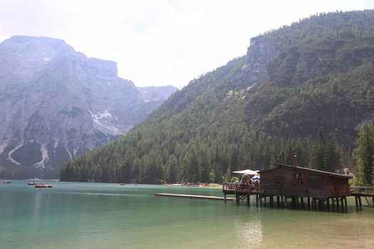 Wooden hut on lake Braies, Dolomites, Italy