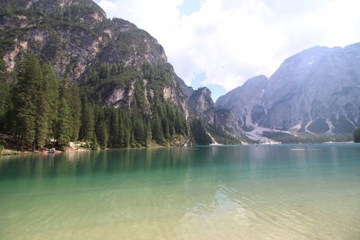 Braies lake turquoise water and Dolomites Alps view, South Tyrol region of Italy