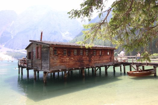 Wooden hut on lake Braies, Dolomites, Italy