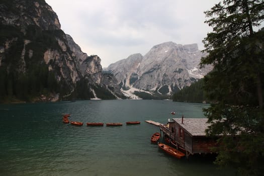 Braies lake at summer. Largest natural lake in Dolomites, South Tyrol, Italy, Europe. Beauty of nature background.