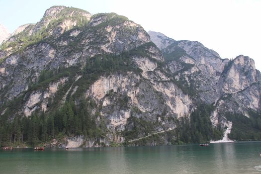 Braies lake turquoise water and Dolomites Alps view, South Tyrol region of Italy