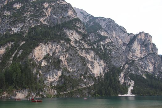 Braies lake turquoise water and Dolomites Alps view, South Tyrol region of Italy