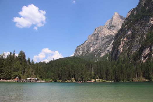 Braies lake turquoise water and Dolomites Alps view, South Tyrol region of Italy