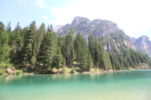 Braies lake turquoise water and Dolomites Alps view, South Tyrol region of Italy