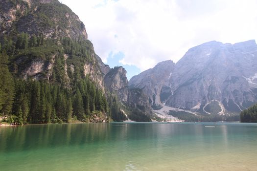 Braies lake turquoise water and Dolomites Alps view, South Tyrol region of Italy