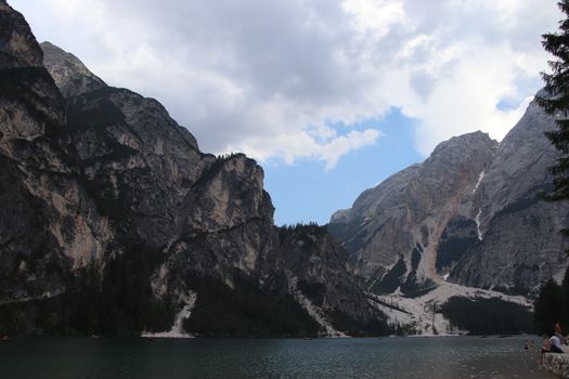 Braies lake turquoise water and Dolomites Alps view, South Tyrol region of Italy