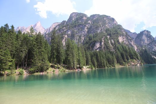 Braies lake turquoise water and Dolomites Alps view, South Tyrol region of Italy