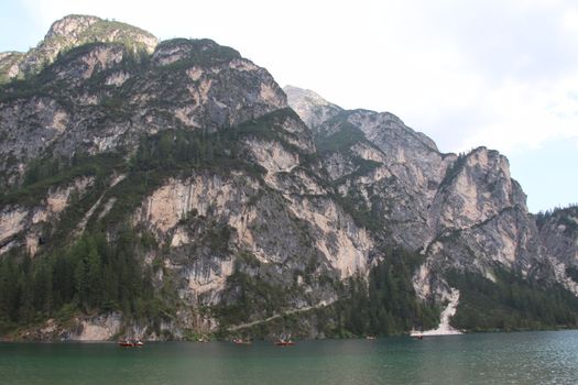 Braies lake turquoise water and Dolomites Alps view, South Tyrol region of Italy