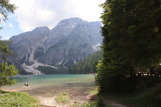 Braies lake turquoise water and Dolomites Alps view, South Tyrol region of Italy