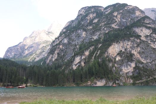 Braies lake turquoise water and Dolomites Alps view, South Tyrol region of Italy