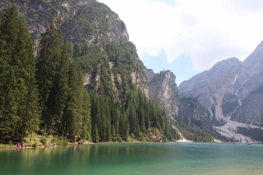 Braies lake turquoise water and Dolomites Alps view, South Tyrol region of Italy