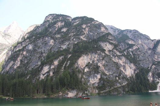 Braies lake turquoise water and Dolomites Alps view, South Tyrol region of Italy