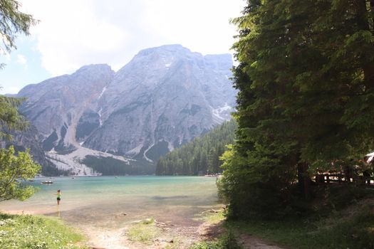 Braies lake turquoise water and Dolomites Alps view, South Tyrol region of Italy