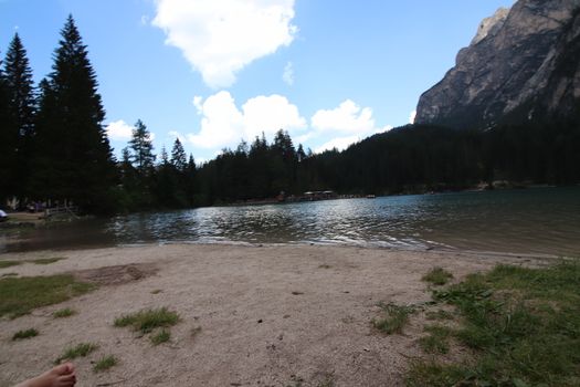 Braies lake at summer. Largest natural lake in Dolomites, South Tyrol, Italy, Europe. Beauty of nature background.