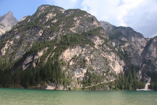 Braies lake turquoise water and Dolomites Alps view, South Tyrol region of Italy