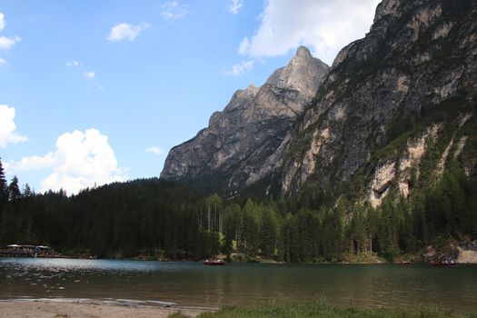 Braies lake turquoise water and Dolomites Alps view, South Tyrol region of Italy