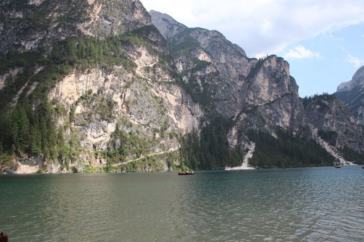 Braies lake turquoise water and Dolomites Alps view, South Tyrol region of Italy