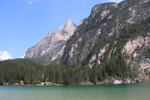 Braies lake turquoise water and Dolomites Alps view, South Tyrol region of Italy