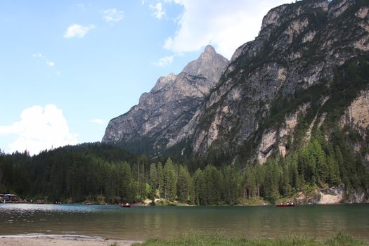 Braies lake turquoise water and Dolomites Alps view, South Tyrol region of Italy