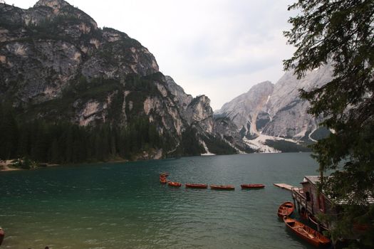 Braies lake at summer. Largest natural lake in Dolomites, South Tyrol, Italy, Europe. Beauty of nature background.