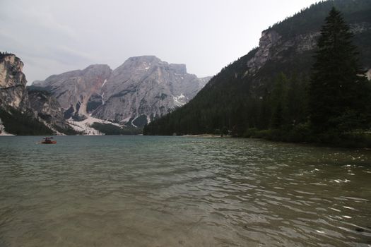 Braies lake at summer. Largest natural lake in Dolomites, South Tyrol, Italy, Europe. Beauty of nature background.