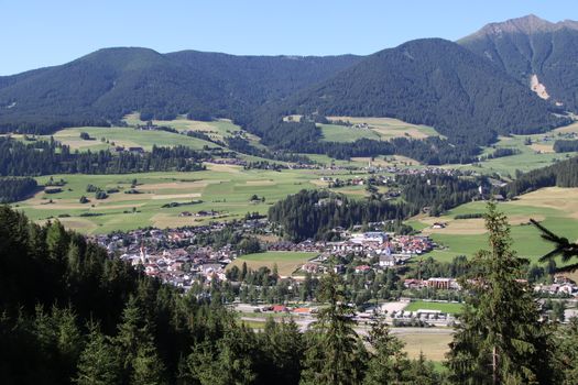 Aerial view of valley and small city