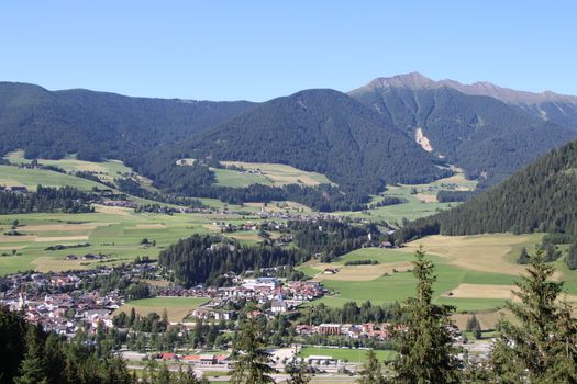 Aerial view of valley and small city