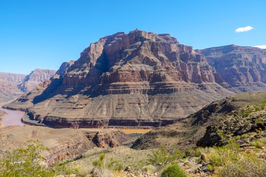 Picturesque landscape view of Grand Canyon National Park with Colorado river during sunny day. Arizona, USA. Famous travel destination.