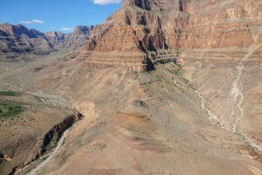 Picturesque landscape view of Grand Canyon National Park with Colorado river during sunny day. Arizona, USA. Famous travel destination.