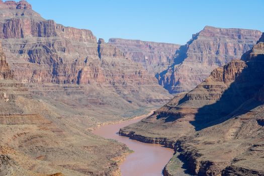 Picturesque landscape view of Grand Canyon National Park with Colorado river during sunny day. Arizona, USA. Famous travel destination.