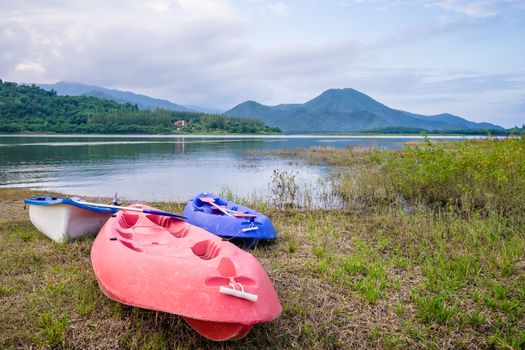 kayak near the lake with mountain background