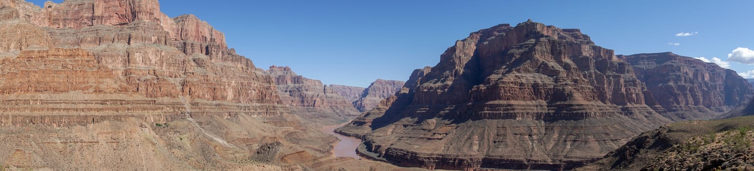 Picturesque landscape view of Grand Canyon National Park with Colorado river during sunny day. Arizona, USA. Famous travel destination.