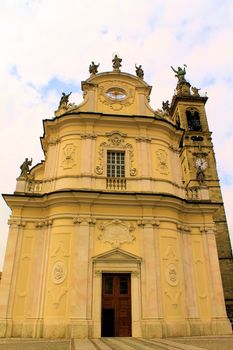 Golden Statue at Top of Church in Bergamo Italy