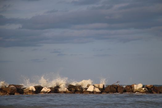 Rocks to protect the coast in the Adriatic sea in Italy