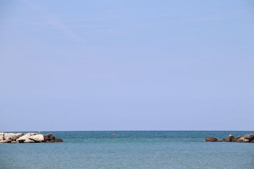 Rocks to protect the coast in the Adriatic sea in Italy