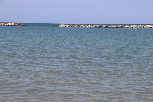 Rocks to protect the coast in the Adriatic sea in Italy