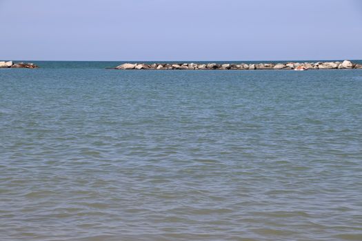 Rocks to protect the coast in the Adriatic sea in Italy