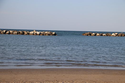 Rocks to protect the coast in the Adriatic sea in Italy