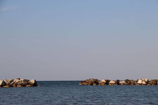 Rocks to protect the coast in the Adriatic sea in Italy