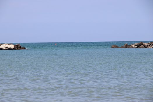 Rocks to protect the coast in the Adriatic sea in Italy