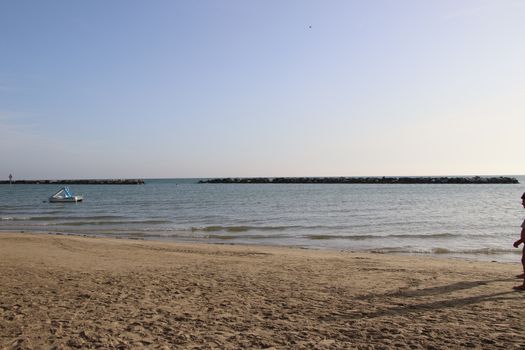 view of the blue ocean waves on the beach.