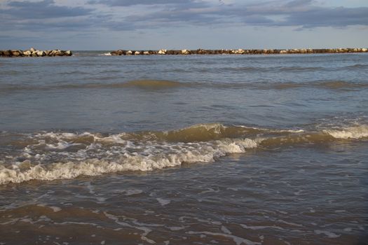 view of the blue ocean waves on the beach.