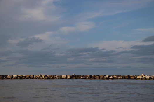 Rocks to protect the coast in the Adriatic sea in Italy