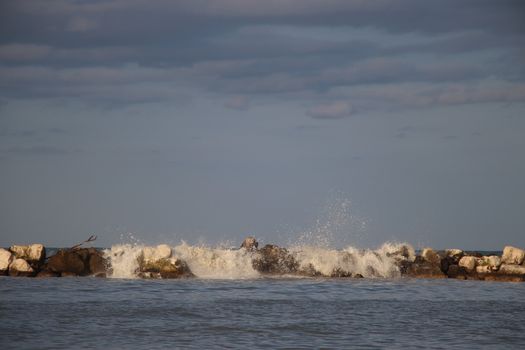 Rocks to protect the coast in the Adriatic sea in Italy