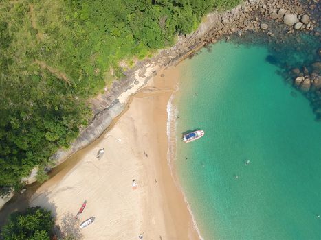 Aerial view of white sandy beach with turquoise water in tropical country. Sandy tropical beach with palm trees. holiday destination. Brazil