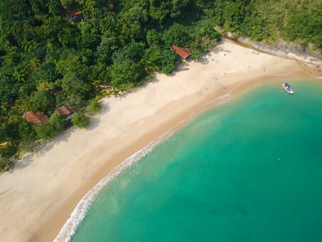 Aerial view of white sandy beach with turquoise water in tropical country. Sandy tropical beach with palm trees. holiday destination. Brazil