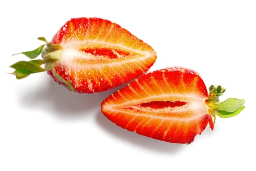 Fresh halved strawberry isolated on white background with clipping pat.