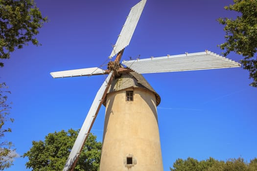 Saint Reverend, France - July 24, 2016 : architecture detail of the windmill still active on a summer day